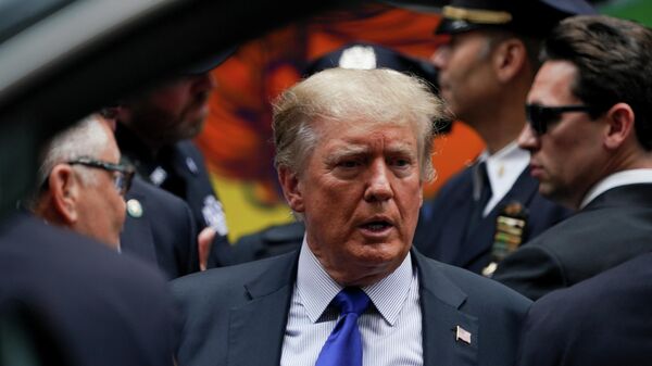 Former U.S. President Donald Trump looks on as he visits the 17th Precinct of the New York City Police Department during the commemoration of the 20th anniversary of the September 11, 2001 attacks in New York City, New York, U.S., September 11, 2021 - Sputnik International