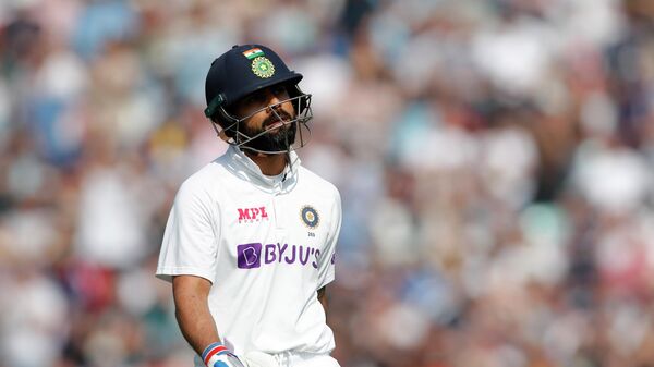  India's Virat Kohli walks after losing his wicket - Sputnik International