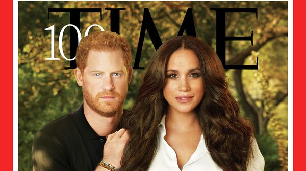 Britain's Prince Harry and Meghan, Duchess of Sussex, appear on the cover of Time magazine's 100 most influential people in the world edition in this handout photo released to Reuters on September 15, 2021.  - Sputnik International