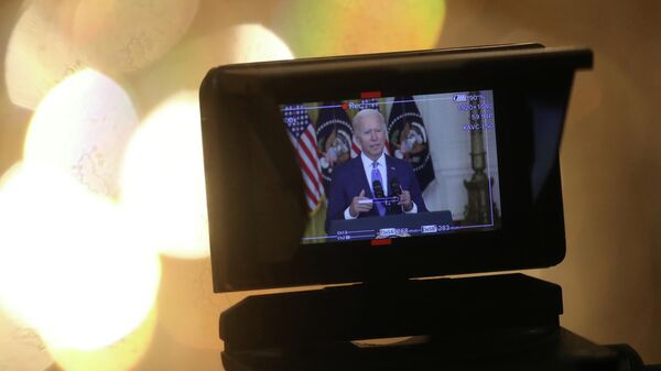 U.S. President Joe Biden is seen through a TV camera monitor as he delivers remarks on the economy during a speech in the East Room of the White House in Washington, U.S., September 16, 2021 - Sputnik International