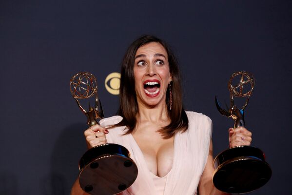 Lucia Aniello poses with her awards for Outstanding Directing for a Comedy Series and Outstanding Writing for a Comedy Series, for &#x27;Hacks&#x27;, at the 73rd Primetime Emmy Awards in Los Angeles, US, 19 September 2021. - Sputnik International