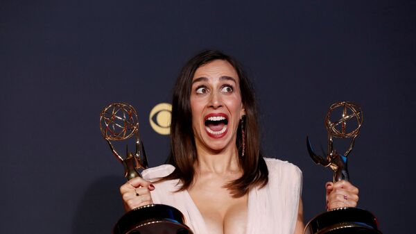 Lucia Aniello poses with her awards for Outstanding Directing for a Comedy Series and Outstanding Writing for a Comedy Series, for Hacks, at the 73rd Primetime Emmy Awards in Los Angeles, U.S., September 19, 2021. - Sputnik International