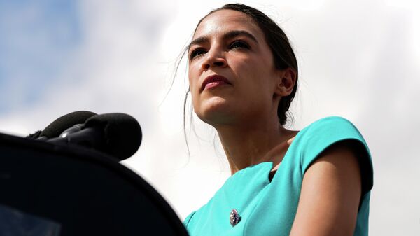 U.S. Representative Alexandria Ocasio-Cortez (D-NY) pauses while speaking during a news conference discussing the introduction of rent legislation outside the U.S. Capitol in Washington, U.S., September 21, 2021 - Sputnik International