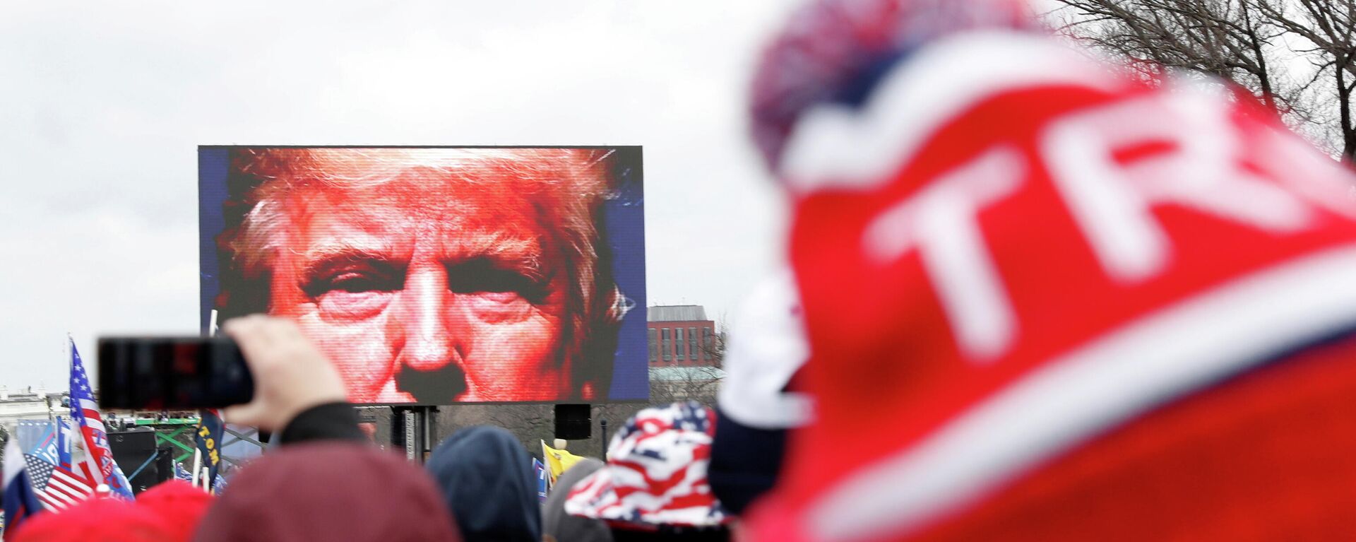 U.S. President Donald Trump is seen on a screen speaking to supporters during a rally to contest the certification of the 2020 U.S. presidential election results by the U.S. Congress, in Washington, U.S, January 6, 2021. Picture taken January 6, 2021. REUTERS/Shannon Stapleton/File Photo/File Photo - Sputnik International, 1920, 19.10.2021
