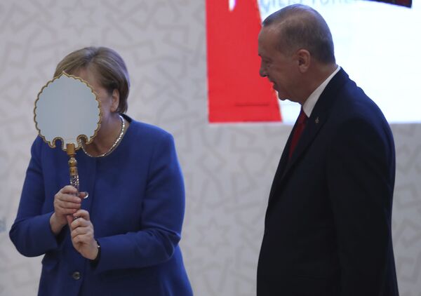 Angela Merkel and Turkish President Recep Tayyip Erdogan at the opening of the Turkish-German University campus in Istanbul. 24 January 2020. - Sputnik International