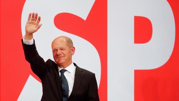 Social Democratic Party (SPD) leader and top candidate for chancellor Olaf Scholz reacts after first exit polls for the general elections in Berlin, Germany, September 26, 2021.  REUTERS/Wolfgang Rattay - Sputnik International