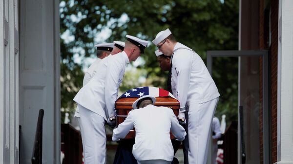 Members of the military carry the remains of U.S. Navy Corpsman Max Soviak, one of 13 U.S. service members killed in the airport suicide bombing in Afghanistan's capital Kabul, as they are returned to his hometown of Berlin Heights, Ohio, U.S., September 8, 2021 - Sputnik International