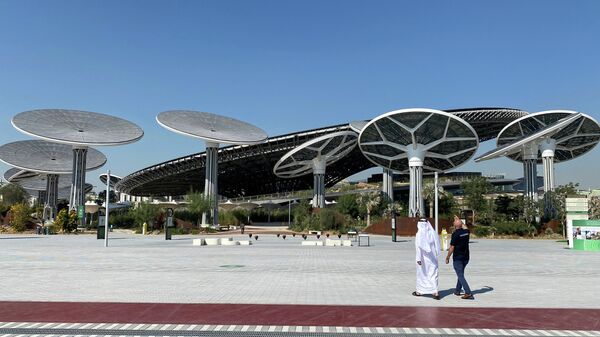 People walk at the site of Dubai Expo 2020 in Dubai, United Arab Emirates January 16, 2021 - Sputnik International