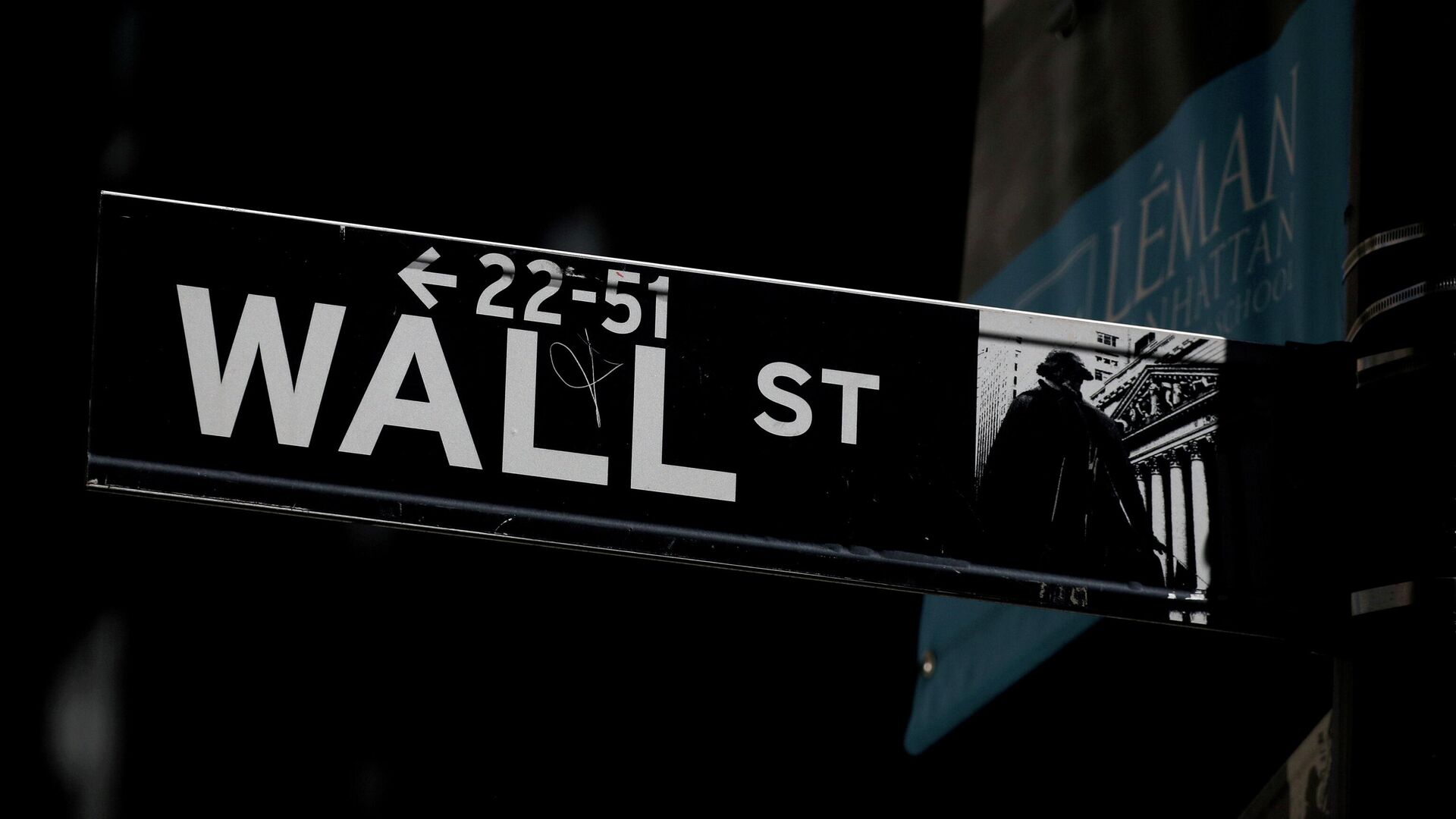A Wall St. street sign is seen near the New York Stock Exchange (NYSE) in New York City, U.S., September 17, 2019. - Sputnik International, 1920, 04.10.2021