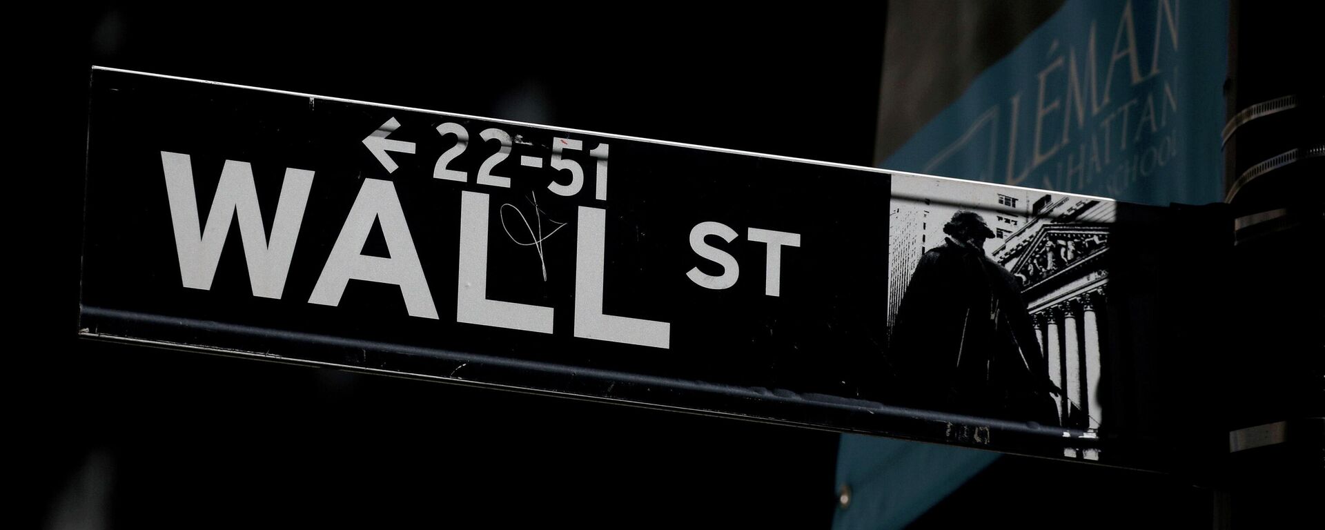 A Wall St. street sign is seen near the New York Stock Exchange (NYSE) in New York City, U.S., September 17, 2019. - Sputnik International, 1920, 08.10.2021