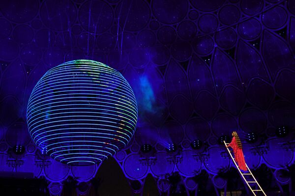 An Emirati artist performs during the opening ceremony of the Dubai Expo 2020. The United Arab Emirates hopes to welcome about 25 million visitors for Expo 2020, the first universal exhibition held in the Middle East and one of the largest events globally since the start of the COVID-19 pandemic. - Sputnik International