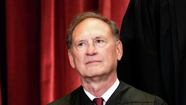 Associate Justice Samuel Alito poses during a group photo of the Justices at the Supreme Court in Washington, U.S., April 23, 2021. - Sputnik International