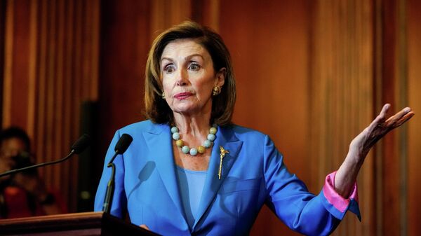 U.S. House Speaker Nancy Pelosi (D-CA) speaks while signing the continuing resolution to avoid a U.S. government shutdown during a bill enrollment ceremony on Capitol Hill in Washington, U.S., September 30, 2021 - Sputnik International