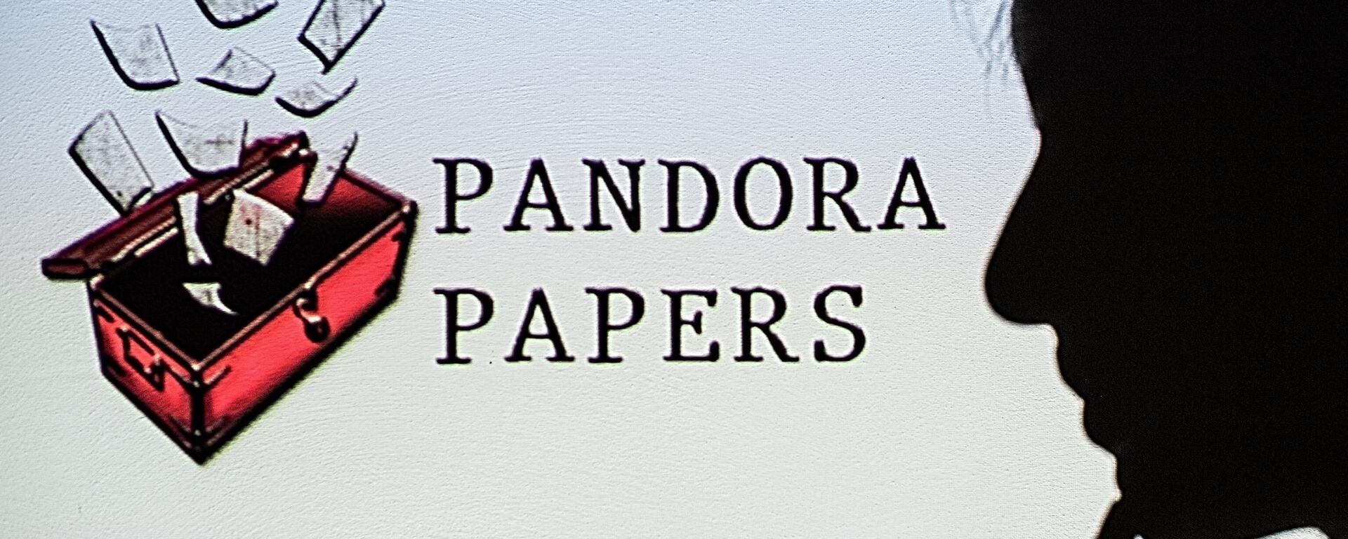 This photograph illustration shows a woman's shadow cast on the logo of Pandora Papers, in Lavau-sur-Loire, western France, on October 4, 2021 - Sputnik International, 1920, 05.10.2021