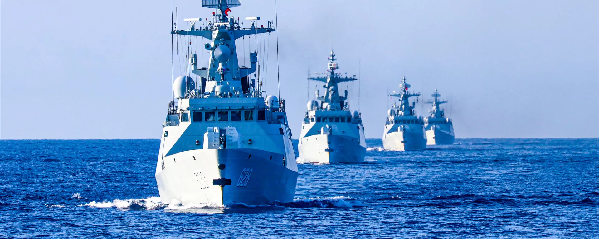 The frigate Enshi (Hull 627), Yongzhou (Hull 628), Bazhong (Hull 625), and Wuzhou (Hull 626) steam in formation during a 9-day maritime training exercise in waters of the South China Sea in late November, 2020. They are attached to a frigate flotilla of the navy under the PLA Southern Theater Command. - Sputnik International, 1920, 15.07.2024