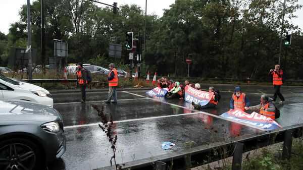 Insulate Britain activists block a motorway junction near Heathrow Airport, in London, Britain, October 1, 2021 - Sputnik International