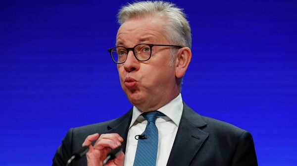 Britain's Housing Secretary Michael Gove delivers a speech during the annual Conservative Party conference, in Manchester, Britain, October 4, 2021. - Sputnik International