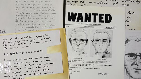 FILE - In this May 3, 2018, file photo, a San Francisco Police Department wanted bulletin and copies of letters sent to the San Francisco Chronicle by a man who called himself Zodiac are displayed in San Francisco. A coded letter mailed to a San Francisco newspaper by the Zodiac serial killer in 1969 has been deciphered by a team of amateur sleuths from the United States, Australia and Belgium, the San Francisco Chronicle reported Friday, Dec. 11, 2020. (AP Photo/Eric Risberg, File) - Sputnik International