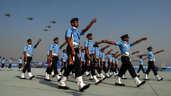 Indian Air Force (IAF) soldiers march during the 89th Air Force Day parade at Hindon Air Force station in Ghaziabad on October 8, 2021 - Sputnik International