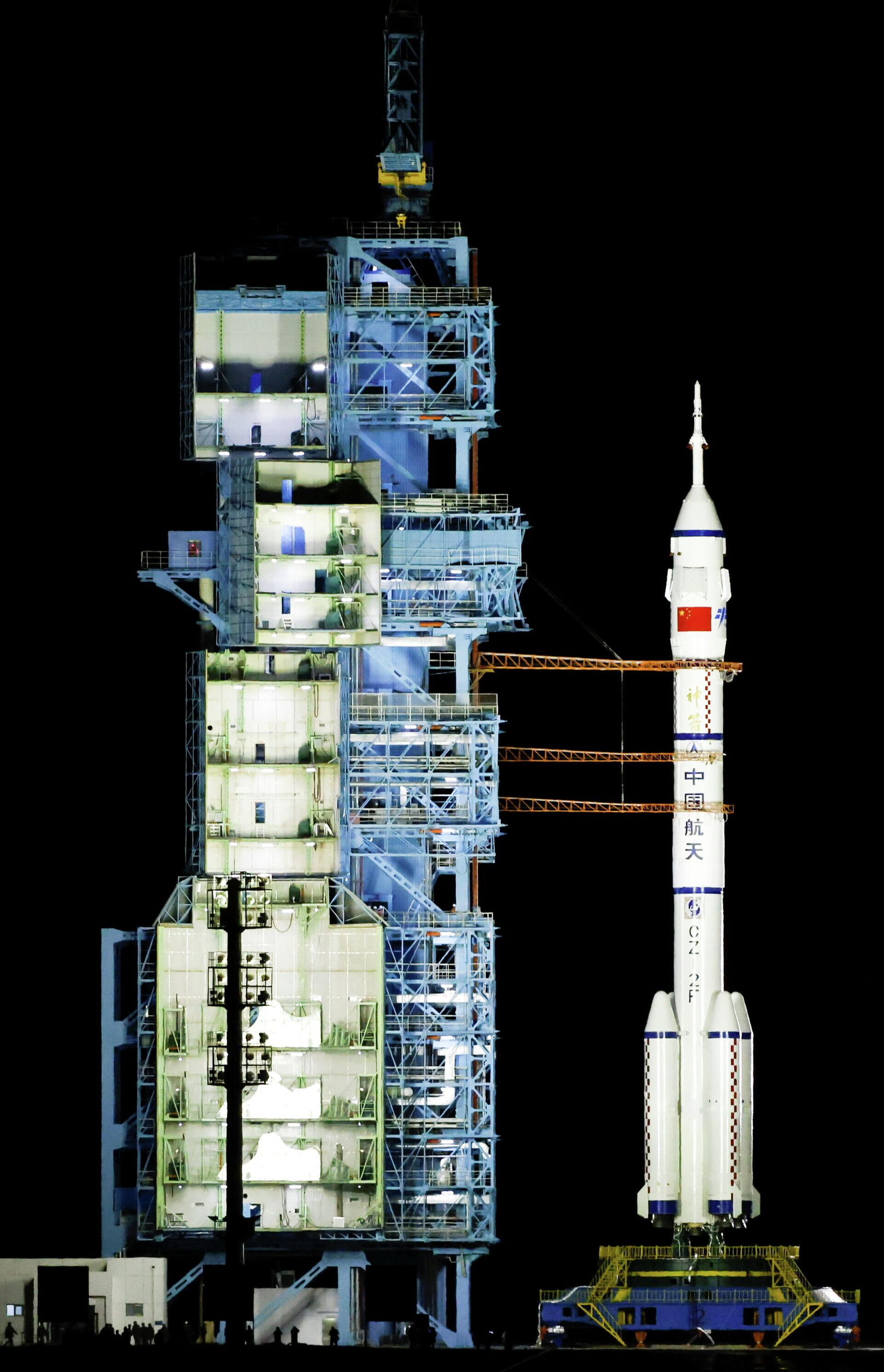 A general view of the Long March-2F Y13 rocket, carrying the Shenzhou-13 spacecraft and three astronauts in China's second crewed mission to build its own space station, before its launch at Jiuquan Satellite Launch Center near Jiuquan, Gansu province, China October 15, 2021. - Sputnik International, 1920, 16.10.2021