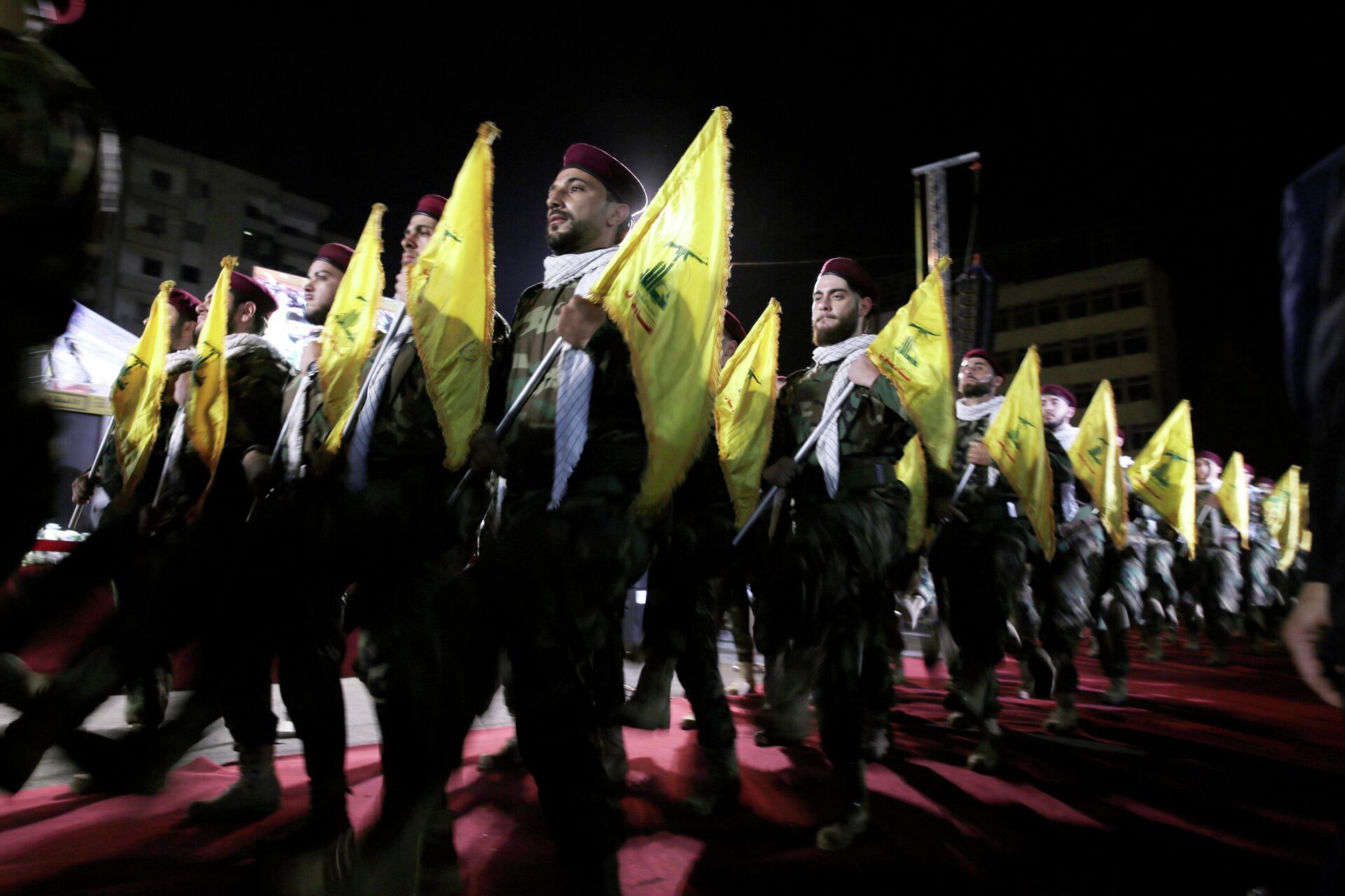  In this May 31, 2019 file photo, Hezbollah fighters march at a rally to mark Jerusalem day or Al-Quds day, in the southern Beirut suburb of Dahiyeh, Lebanon. On Monday, Oct. 18, 2021, Hezbollah leader Sheik Hassan Nasrallah revealed that his militant group has 100,000 trained fighters. - Sputnik International, 1920, 13.05.2022