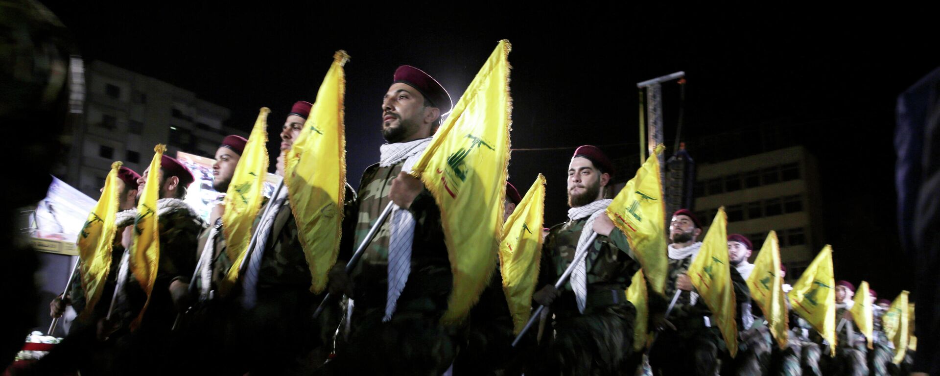  In this May 31, 2019 file photo, Hezbollah fighters march at a rally to mark Jerusalem day or Al-Quds day, in the southern Beirut suburb of Dahiyeh, Lebanon. On Monday, Oct. 18, 2021, Hezbollah leader Sheik Hassan Nasrallah revealed that his militant group has 100,000 trained fighters. - Sputnik International, 1920, 12.10.2023