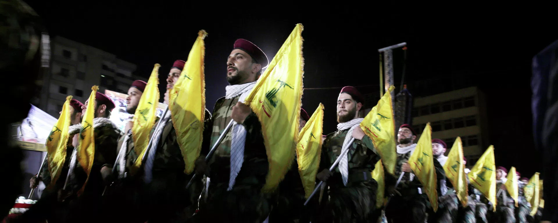  In this May 31, 2019 file photo, Hezbollah fighters march at a rally to mark Jerusalem day or Al-Quds day, in the southern Beirut suburb of Dahiyeh, Lebanon. On Monday, Oct. 18, 2021, Hezbollah leader Sheik Hassan Nasrallah revealed that his militant group has 100,000 trained fighters. - Sputnik International, 1920, 23.10.2023