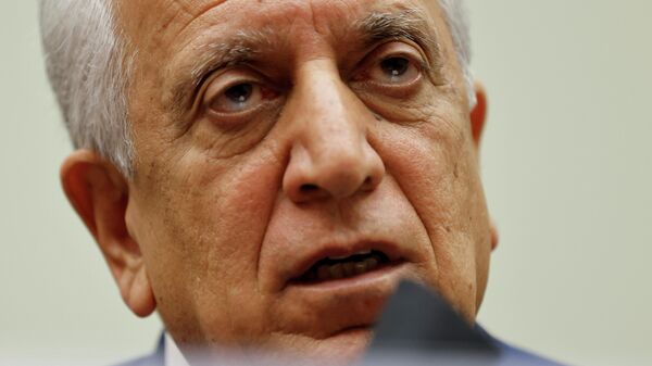 U.S. Special Representative for Afghanistan Reconciliation Zalmay Khalilzad testifies about the potential withdrawal of U.S. military forces from Afghanistan at a hearing before the House Foreign Affairs Committee on Capitol Hill in Washington, U.S. May 18, 2021. - Sputnik International