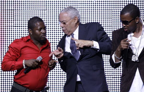 Colin Powell dances onstage with Nigerian hip-hop group Olu Maintain at the Africa Rising Festival at the Royal Albert Hall, Tuesday 14 October 2008.  - Sputnik International