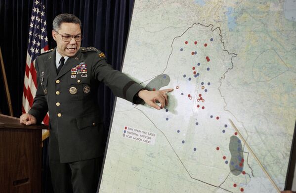 Chairman of the Joint Chiefs of Staff Colin Powell points to Iraqi airbases that had shown activity, at a Pentagon briefing on Wednesday, 24 January 1991 in Washington. - Sputnik International