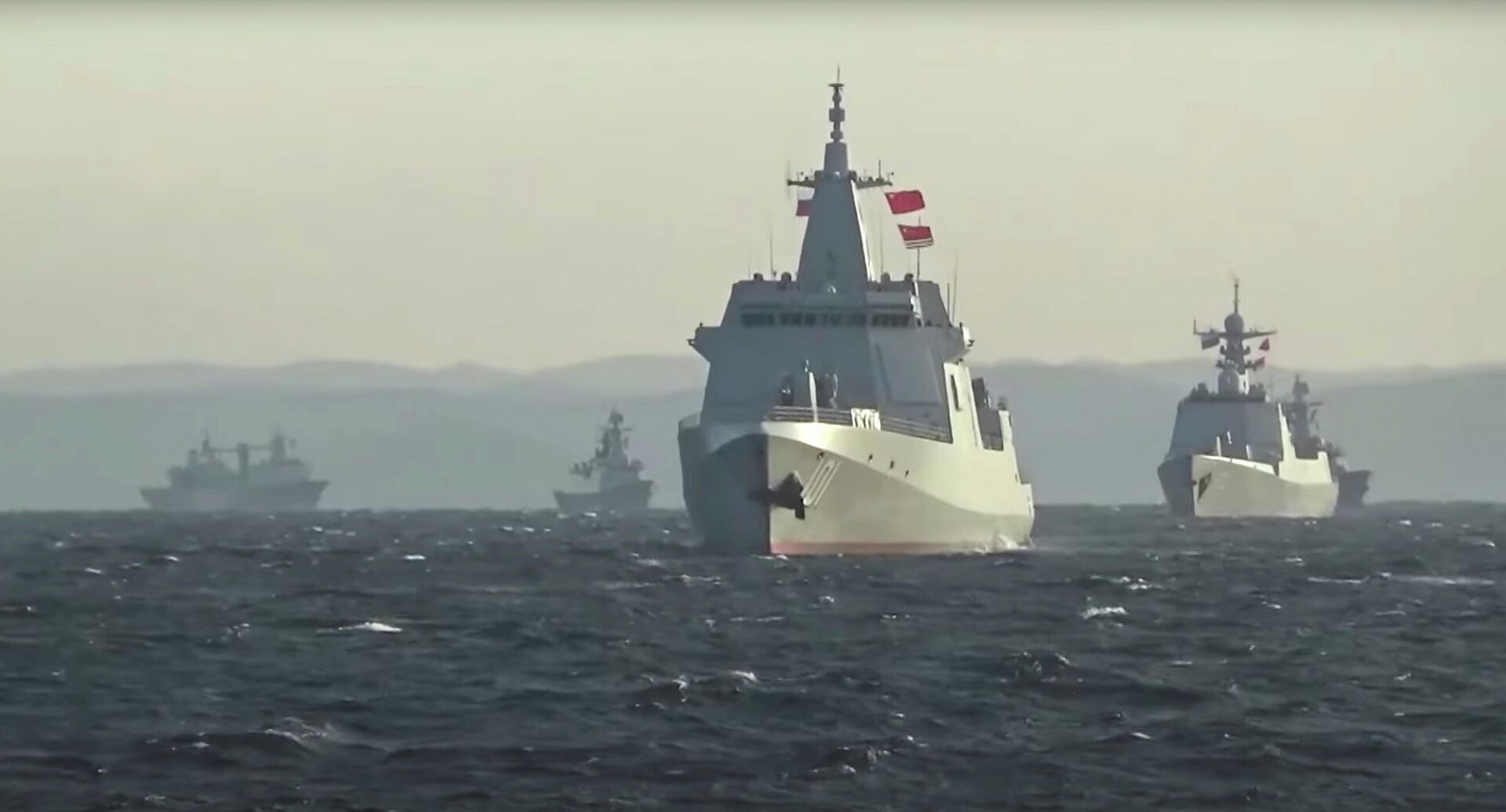 A group of naval vessels from China and Russia sails during joint military drills in the Sea of Japan, in this still image taken from video released on October 18, 2021. Video released October 18, 2021 - Sputnik International, 1920, 26.10.2021