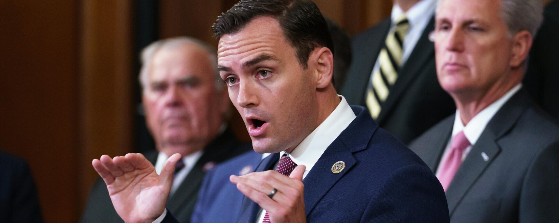 Rep. Mike Gallagher, R-Wis., a former Marine, joins House Minority Leader Kevin McCarthy, R-Calif., right, and other GOP members to criticize President Joe Biden and House Speaker Nancy Pelosi on the close of the war in Afghanistan, at the Capitol in Washington, Tuesday, Aug. 31, 2021. - Sputnik International, 1920, 18.10.2022