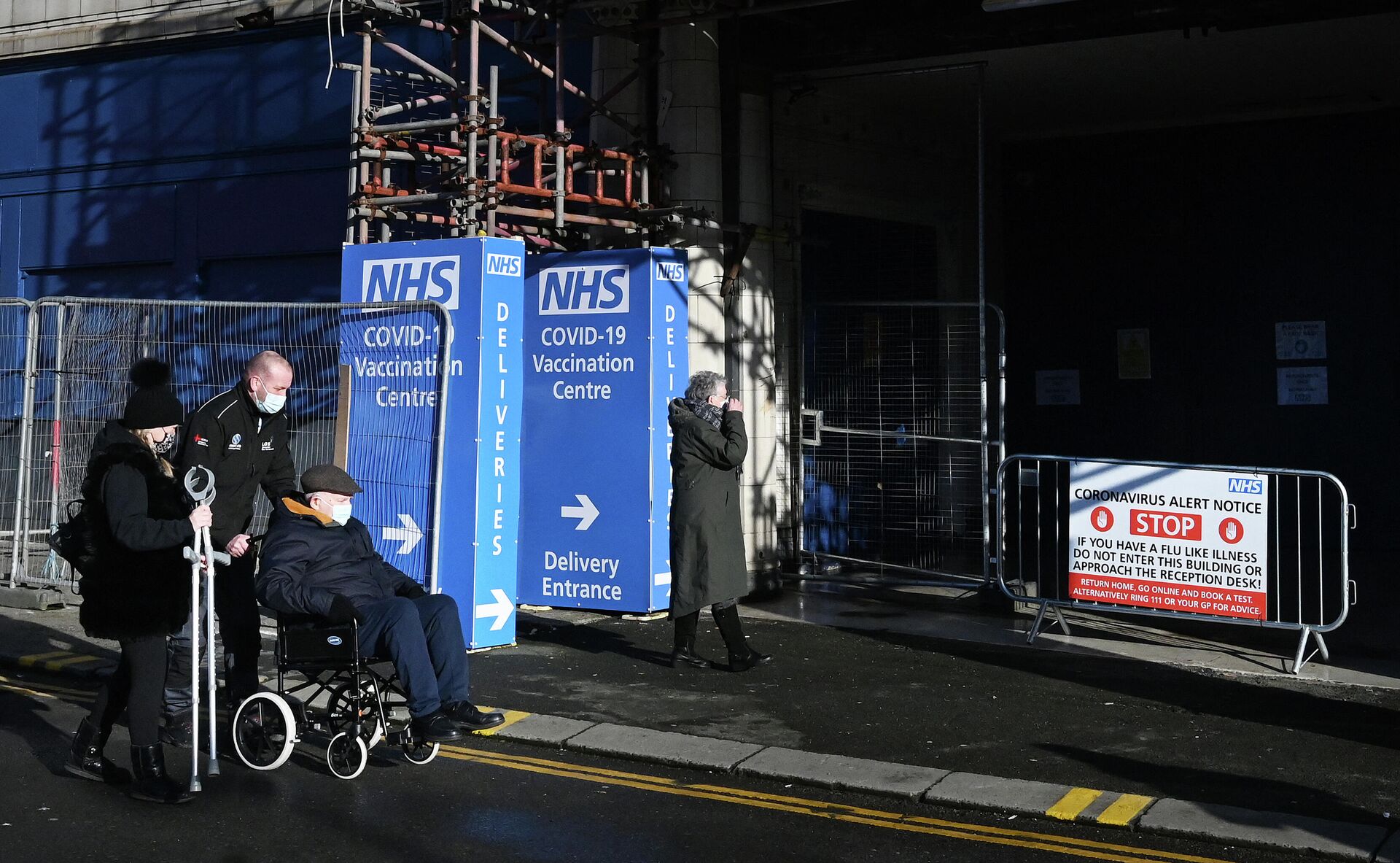 NHS signage is pictured outside the historic Winter Gardens venue in Blackpool, northwest England, on January 25, 2021 which has been converted for use as a vaccination centre - Sputnik International, 1920, 24.10.2021