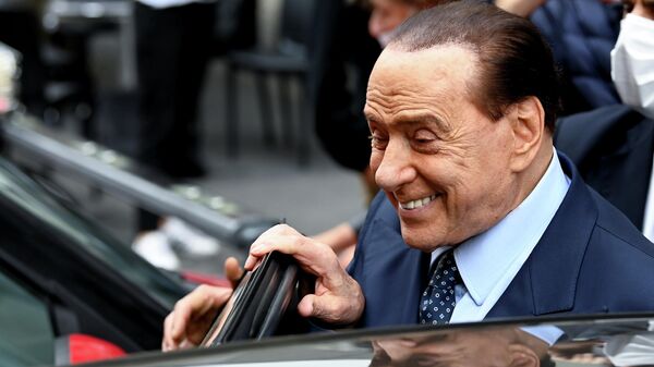 Italy's former Prime Minister Silvio Berlusconi leaves after he voted in Italian elections for mayors and councillors, in Milan, Italy, October 3, 2021. - Sputnik International