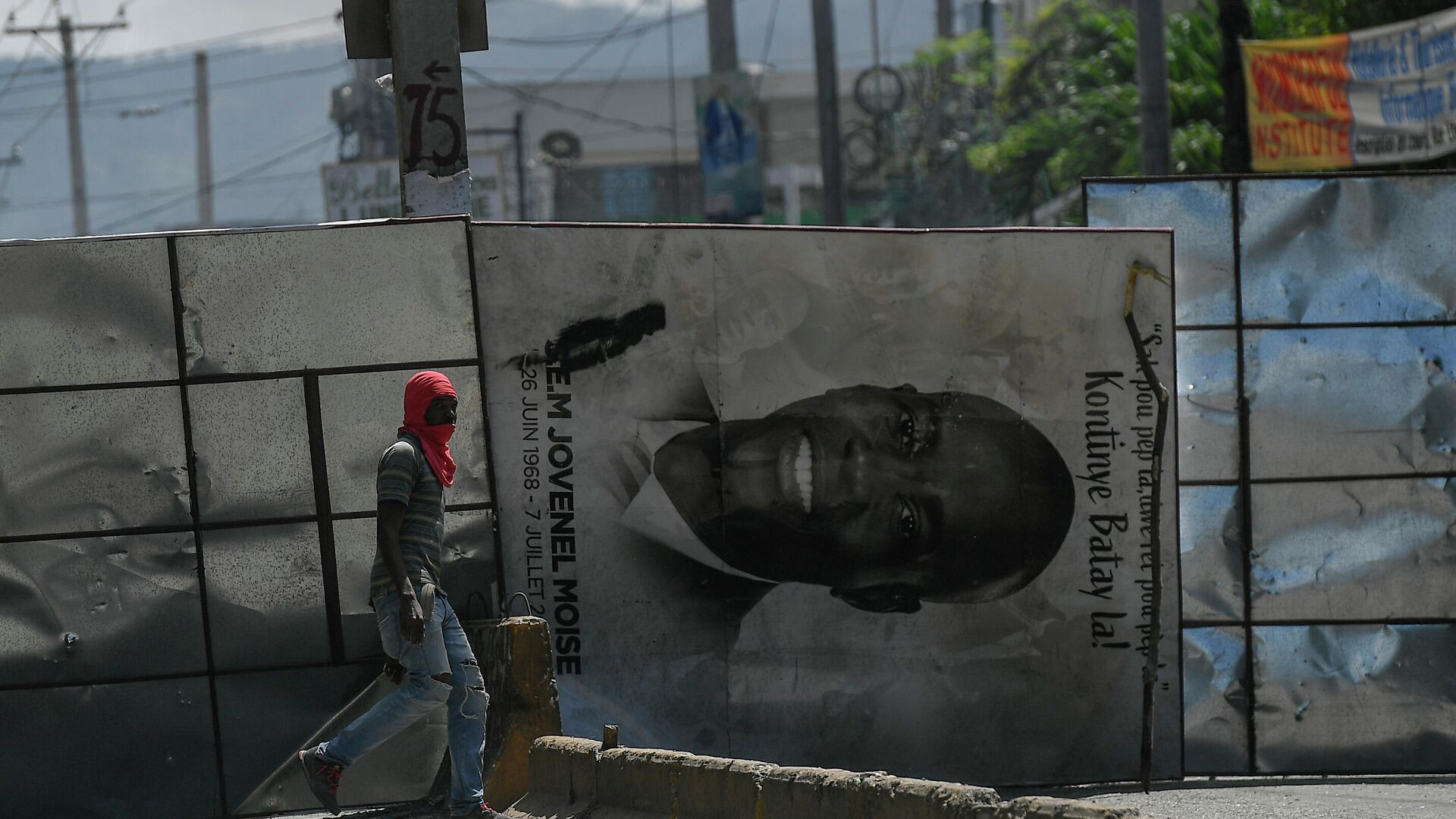 A billboard of slain Haitian President Jovenel Moise is used to block a road during an anti-government protest in Port-au-Prince, Haiti, Thursday, Oct. 21, 2021. - Sputnik International, 1920, 15.01.2022