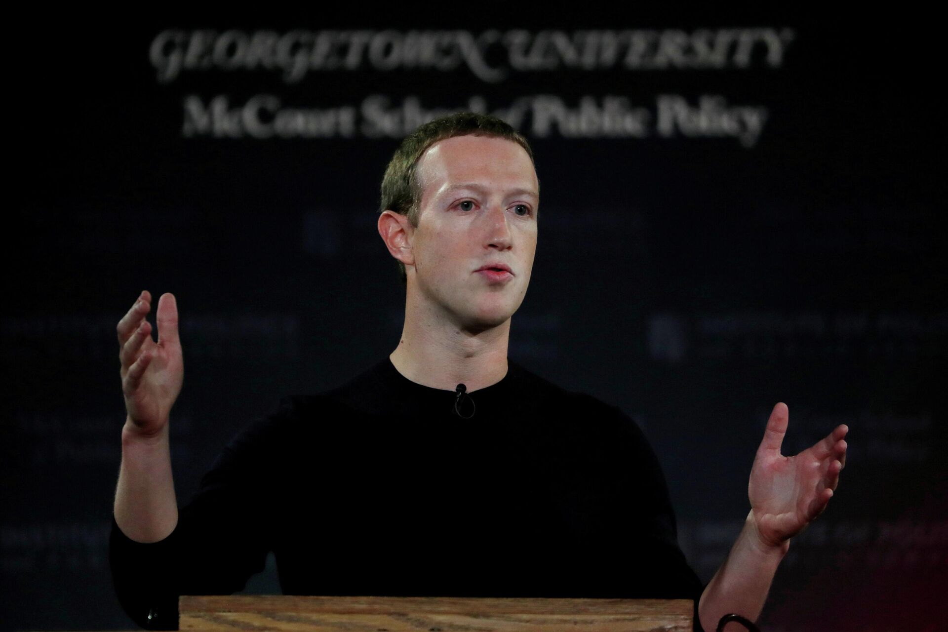 Facebook Chairman and CEO Mark Zuckerberg addresses the audience on the challenges of protecting free speech while combating hate speech online, fighting misinformation, and political data privacy and security, at a forum hosted by Georgetown University's Institute of Politics and Public Service (GU Politics) and the McCourt School of Public Policy in Washington, U.S., October 17, 2019 - Sputnik International, 1920, 26.10.2021
