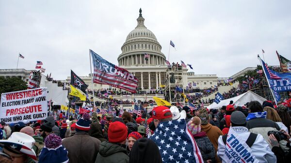 In this Jan. 6, 2021, file photo insurrections loyal to President Donald Trump rally at the U.S. Capitol in Washington. U.S. - Sputnik International