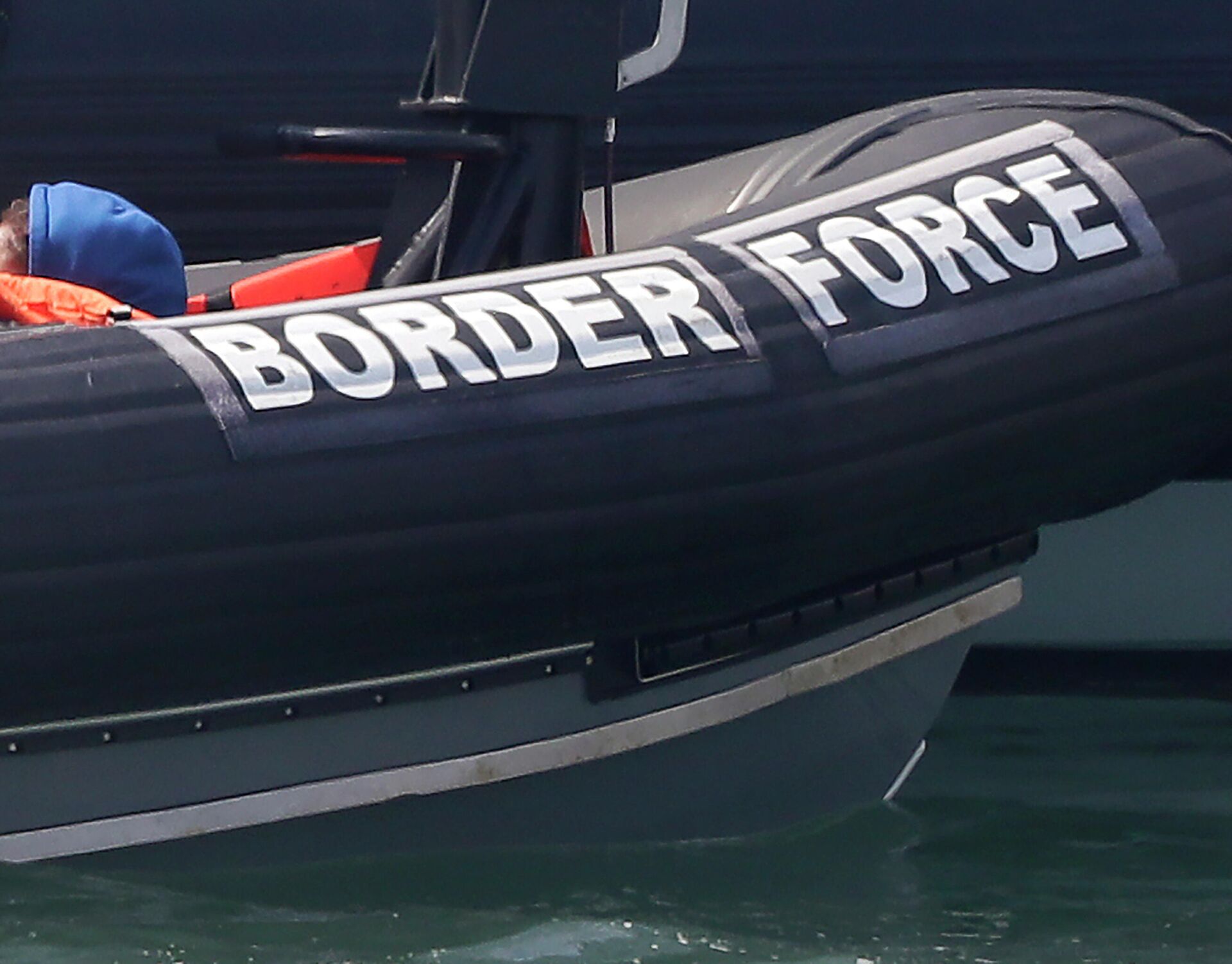In this file photo dated  Saturday Aug. 8, 2020, a Border Force vessel at the port city of Dover, England.  Fifteen migrants have been saved Tuesday Oct. 27, 2020, as search and rescue operations by the Border Force  continue, but at least four migrants, including a 5-year-old and 8-year-old child, have died Tuesday when their boat capsized while they and other migrants tried to cross the English Channel to Britain, French authorities said. (AP Photo/Kirsty Wigglesworth, FILE) - Sputnik International, 1920, 22.11.2021