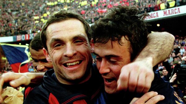 FILE PHOTO: Barcelona's Sergi Barjuan (L) embraces and celebrates the second goal of his team mate Luis Enrique during the Spanish first division soccer match in Barcelona Nou Camp stadium February 14. Barcelona won 3-0 - Sputnik International