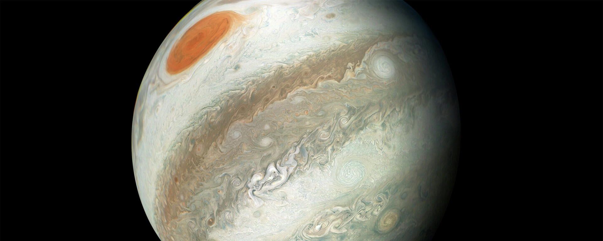 The view shows Jupiter including its Great red Spot captured by NASA's Juno spacecraft on the outbound leg of its 12th close flyby of the gas giant planet, April 1, 2018. - Sputnik International, 1920, 23.06.2022