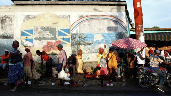 People walk at a market, in Port-au-Prince, Haiti October 23, 2021.  - Sputnik International