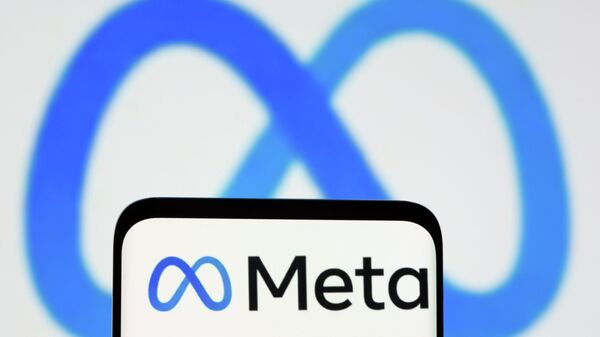 Facebook's new rebrand logo Meta is seen on smartphone in this illustration picture taken October 28, 2021. - Sputnik International