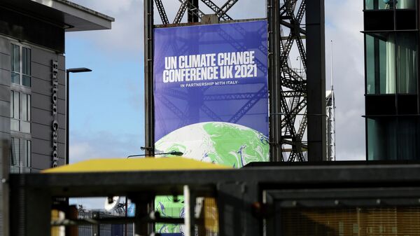 A banner advertising the UN Climate Change Conference (COP26) - Sputnik International