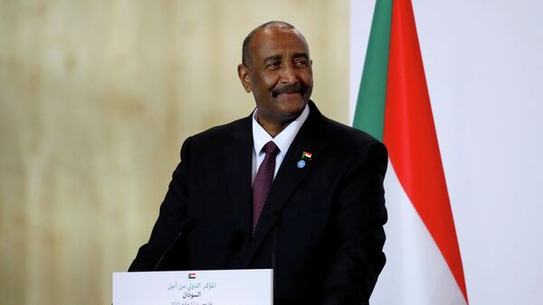 General Abdel Fattah al-Burhan attends a news conference during the International Conference in support of Sudan at the Temporary Grand Palais in Paris, France, May 17, 2021. - Sputnik International