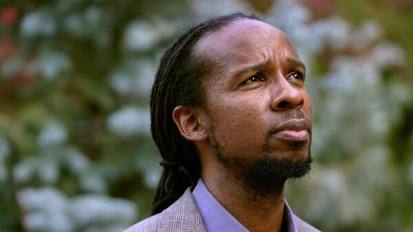 Ibram X. Kendi, director of Boston University's Center for Antiracist Research, stands for a portrait Wednesday, Oct. 21, 2020, in Boston. - Sputnik International