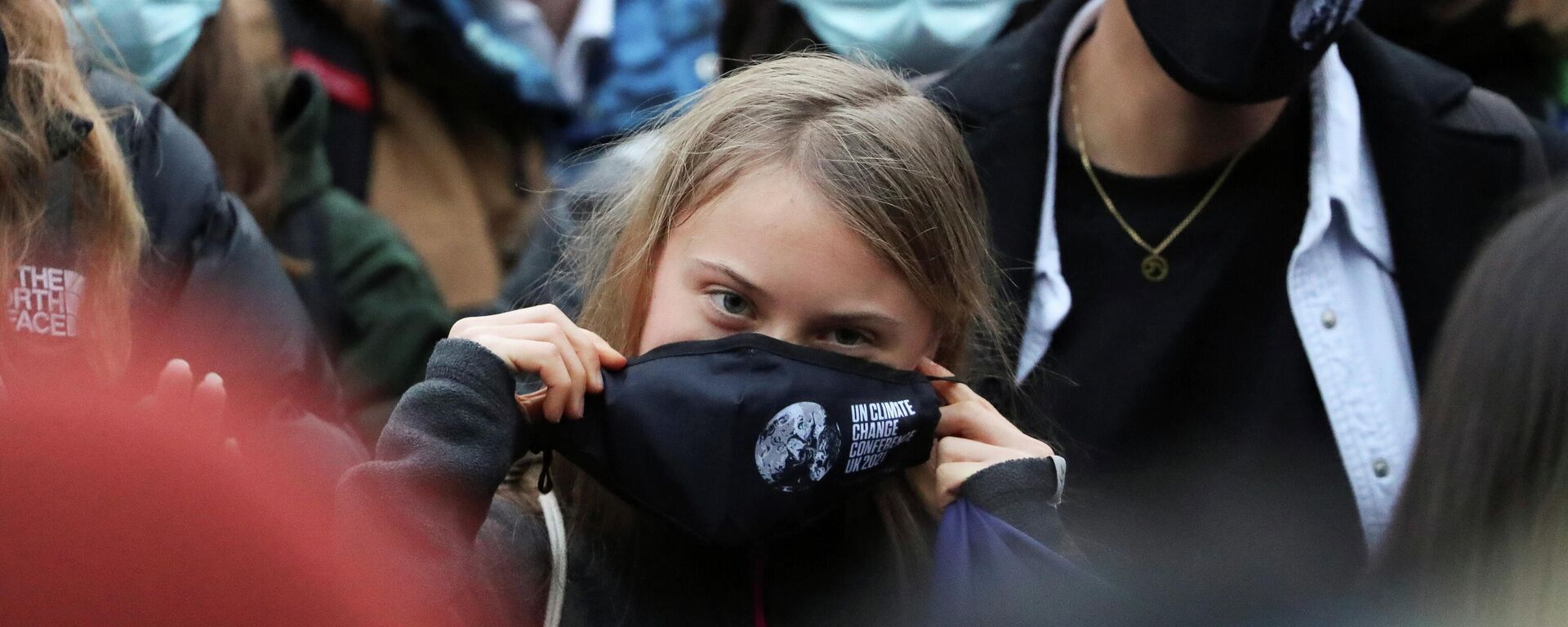 Swedish activist Greta Thunberg adjusts her mask at the Festival Park as the UN Climate Change Conference (COP26) takes place in Glasgow, Scotland, Britain, November 1, 2021 - Sputnik International, 1920, 02.11.2021