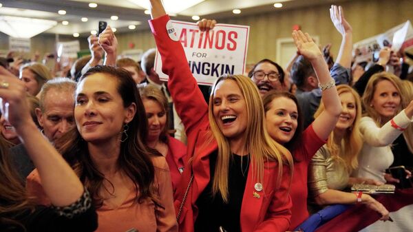 Supporters of Republican nominee for Governor of Virginia Glenn Youngkin react as Fox News declares Youngkin has won his race against Democratic Governor Terry McAuliffe and Youngkin will be the next Governor of Virginia during an election night party at a hotel in Chantilly, Virginia, U.S., November 3, 2021 - Sputnik International