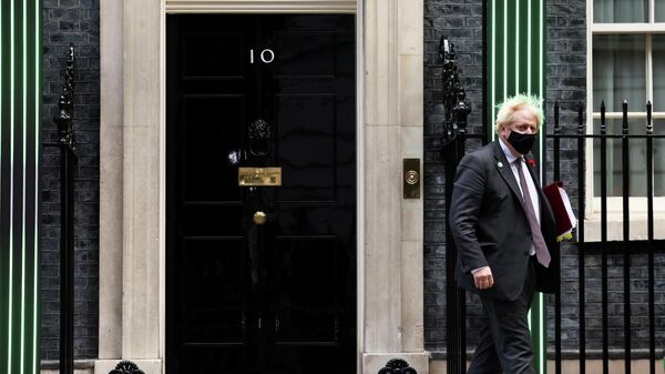 British Prime Minister Boris Johnson leaves 10 Downing Street in London, Britain, November 3, 2021. REUTERS/Henry Nicholls - Sputnik International