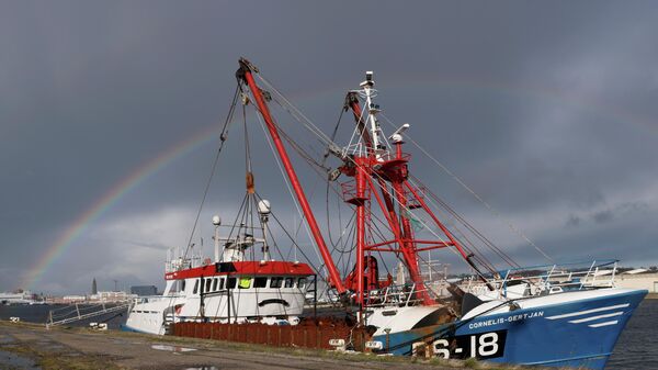 A rainbow appears as British trawler Cornelis Gert Jan is seen moored in the port of Le Havre, after being seized last week?fishing?in the French territorial waters without licence, in Le Havre, France, November 2, 2021 - Sputnik International