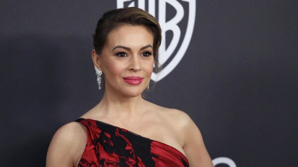 In this Jan. 6, 2019 file photo, Alyssa Milano arrives at the InStyle and Warner Bros. Golden Globes afterparty at the Beverly Hilton Hotel in Beverly Hills, Calif. Actress Alyssa Milano got people riled up on social media with a tweet Friday night, May 10, 2019 calling for women to join her in a sex strike to protest strict abortion bans passed by Republican-controlled legislatures. - Sputnik International